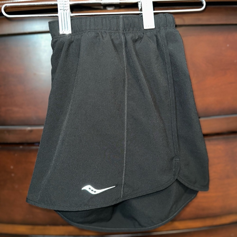 Women’s Saucony Run Dry short size medium - black lined with reflective logo